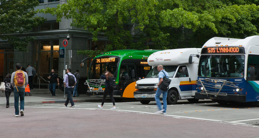 Various Metro buses line up at Bellevue Transit Center. 