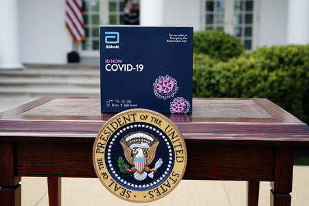 coronavirus test kit behind the presidential seal