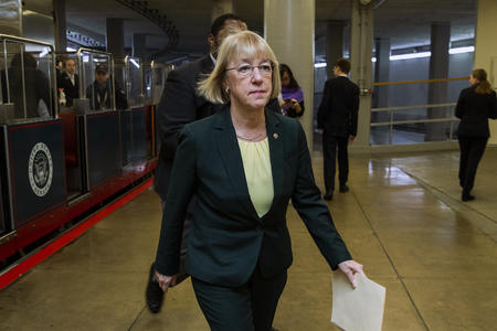 U.S. Sen. Patty Murray walks into the capitol from the Senate subway holding some documents.